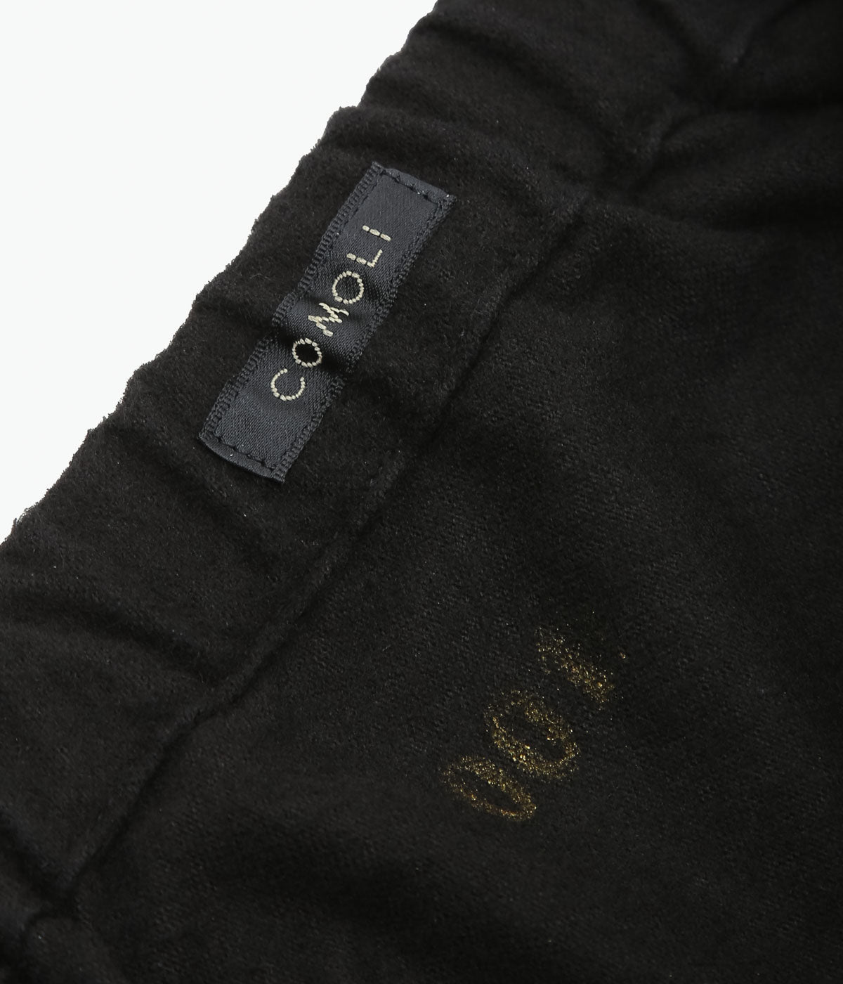 COMOLI ''コットンネル テーパードパンツ'' (BLACK)