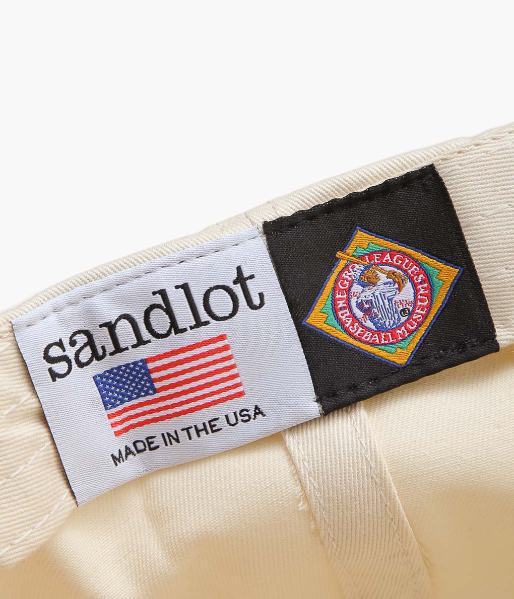 SANDLOT ''ALL NATIONS(COTTON TWILL)'' (NATURAL/ROYAL)