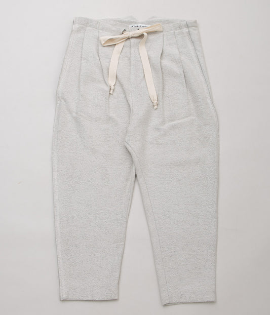 OLUBIYI THOMAS "PLEATED CASUAL DRAWSTRING TROUSERS IN LIGHT GREY COTTON JERSEY" (HEATHER GRAY)