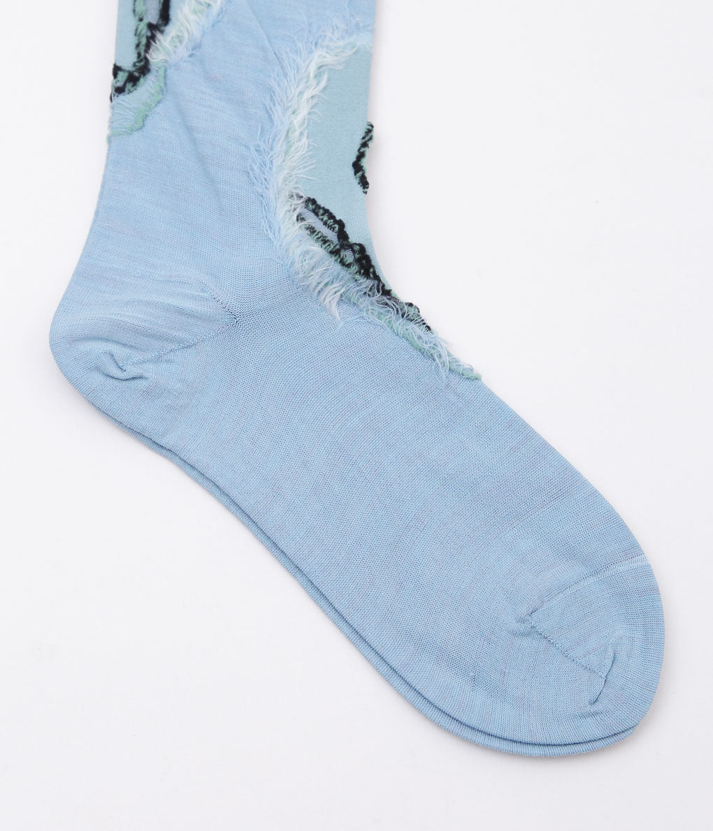 KOTA GUSHIKEN ''MELTED SMILE WITH FRIZBEE REVERSIBLE SOCKS'' (LIGHT BLUE)