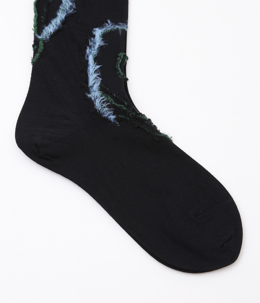 KOTA GUSHIKEN ''MELTED SMILE WITH FRIZBEE REVERSIBLE SOCKS'' (BLACK)