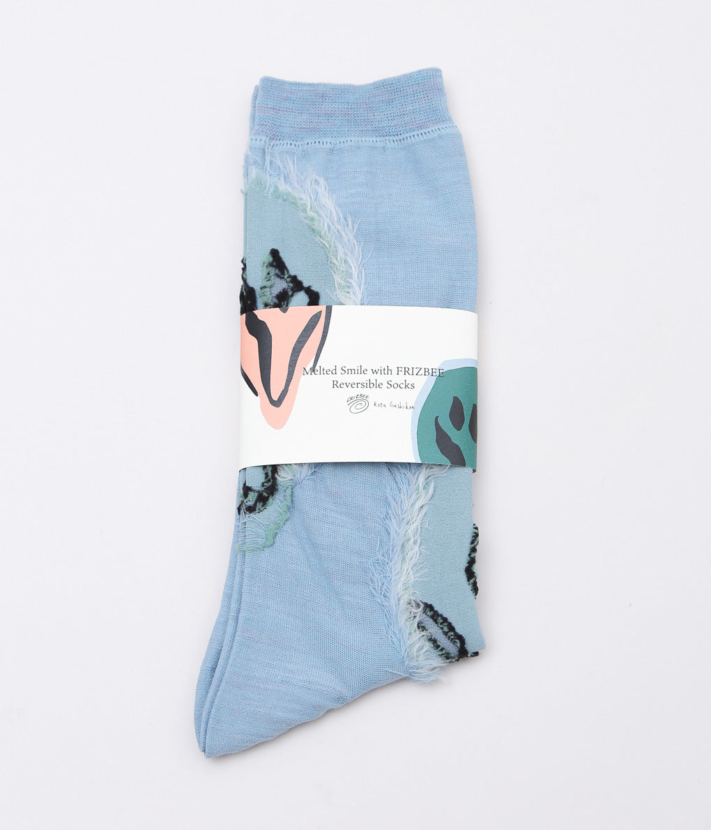 KOTA GUSHIKEN ''MELTED SMILE WITH FRIZBEE REVERSIBLE SOCKS'' (LIGHT BLUE)